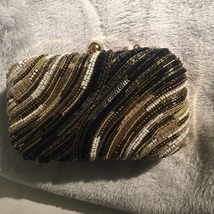 Brand new sequins party clutch. Very elegant.